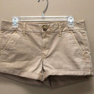 America Eagle stretch midi khaki shorts. Size 6.